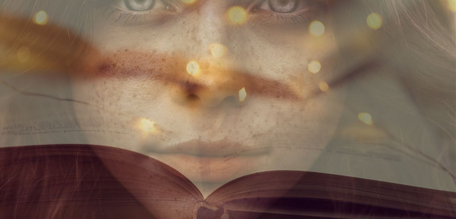 woman peering through lights